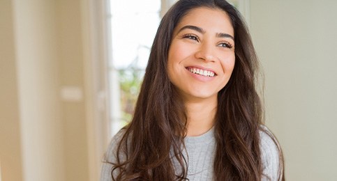 Closeup of woman smiling at home